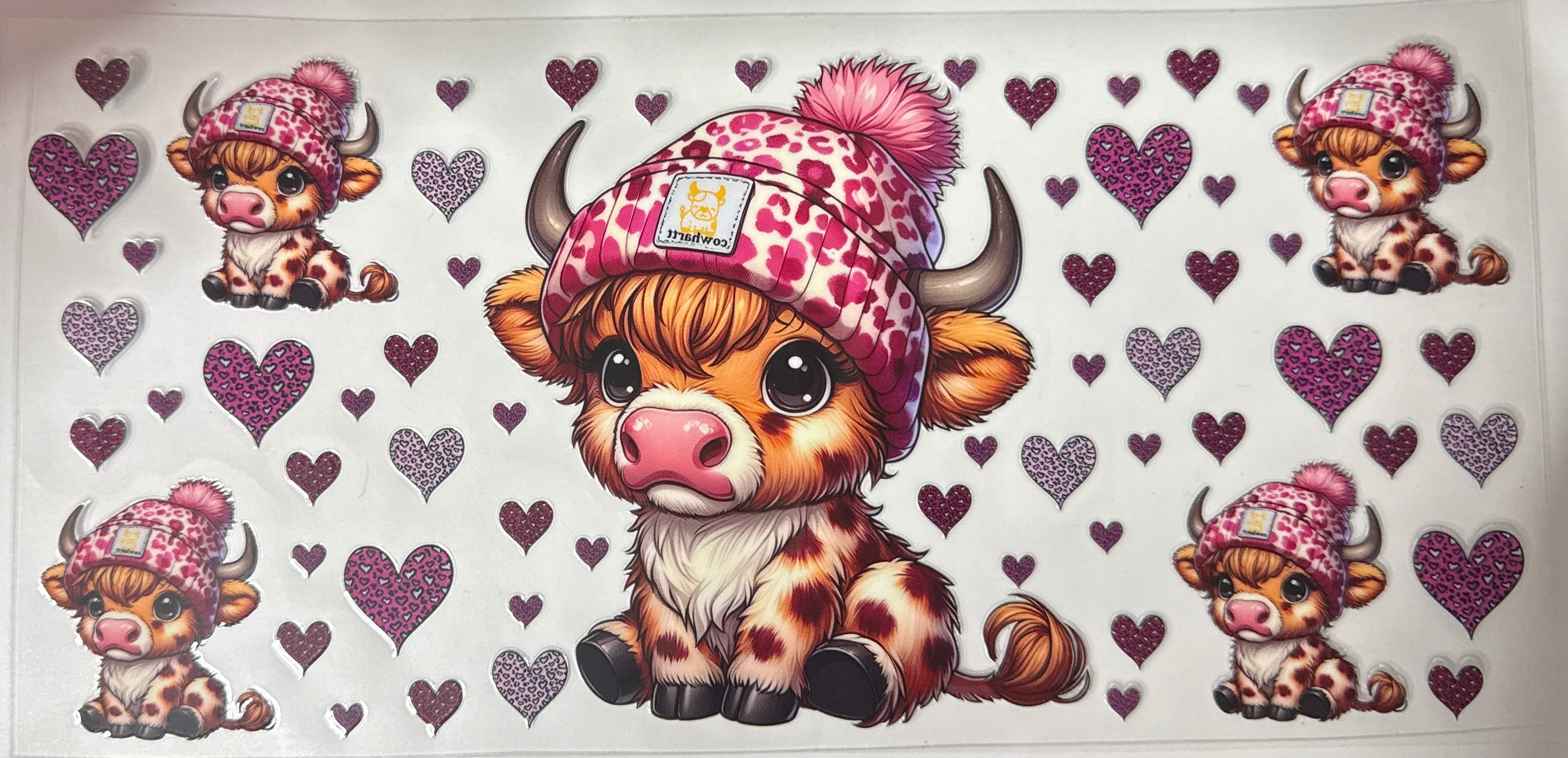Highland cow with cheetah print and hearts