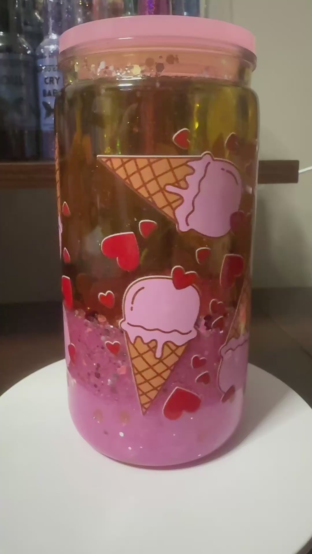16oz Custom Snowglobe tumbler with pink lid/straw
